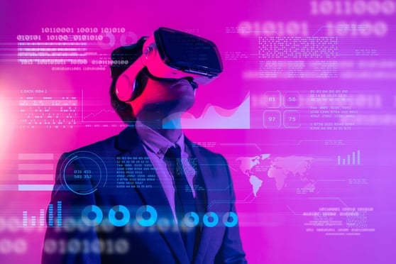 Man with a Oculus on his head, in a purple background.