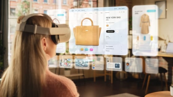 Lady with a VR headset, looking at a series of cards with shopping items.