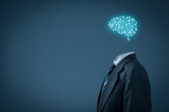 Image of a person standing (without a head) with an image of a blue electric brain on top.